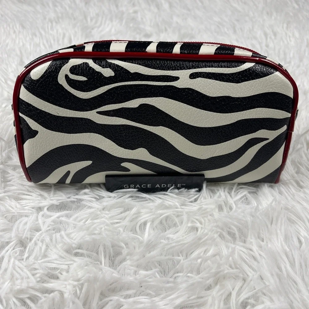 NWOT Grace Adele Zebra Print Cosmetic Bag Black‎ White Red Faux Leather Case